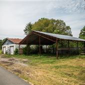 White Lawnmower and Service Building