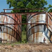 N Lewis Ave/E 66th St N Drum Tanks