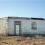 Abandoned White Building